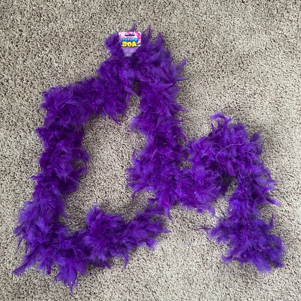 Purple costume feather boa